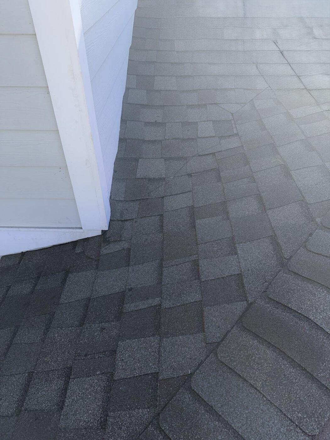 Repaired roof section, clean shingles
