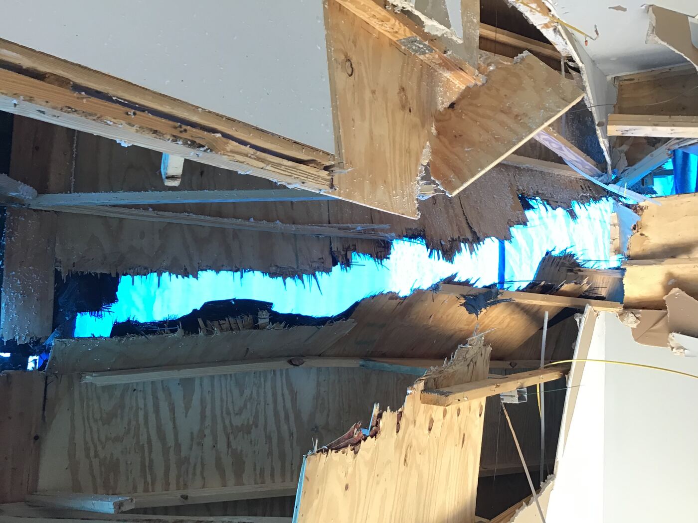 Severe roof deck damage from storm