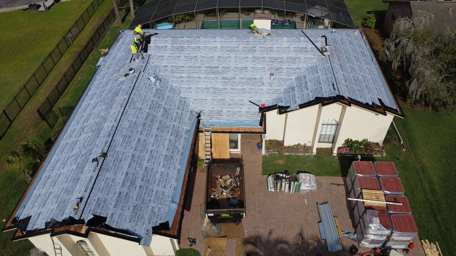 Tile roof underlayment install, aerial